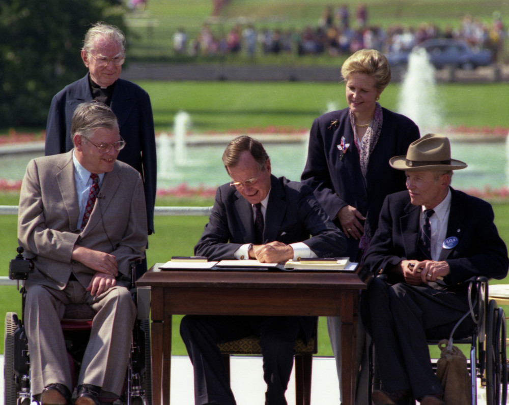 Bush signs ADA Law in 1990